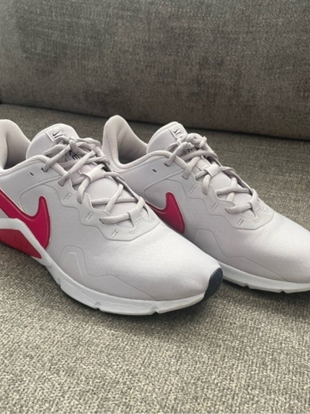 Nike Women’s Light Pink Athletic Sneakers with Pink Swoosh